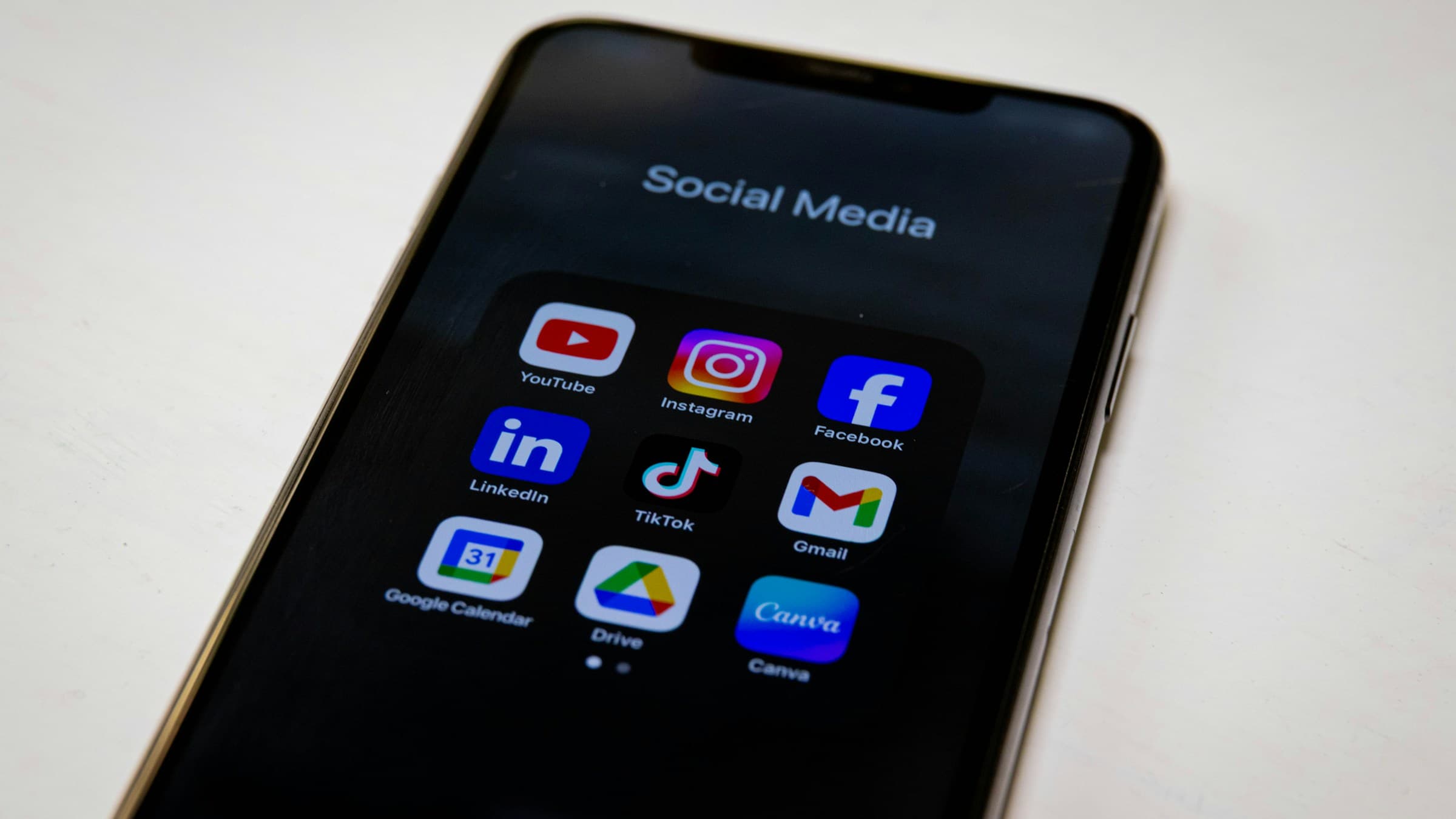 Smartphone showing various social media apps